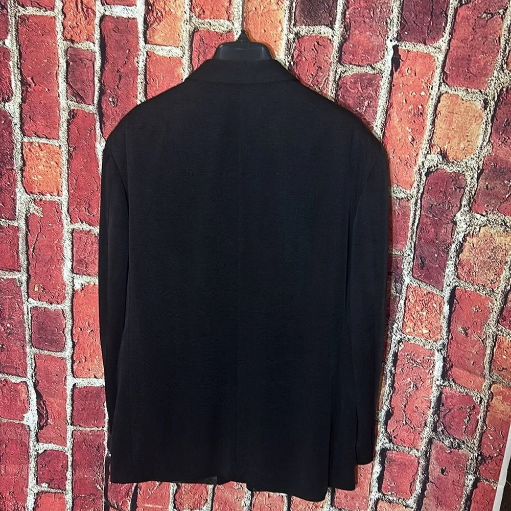 Oscar de la Renta used excellent